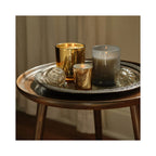 Archipelago Silver Balsam Credenza Candle, three candles lit on a table