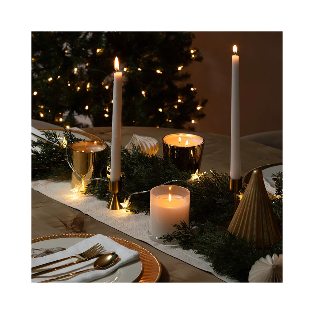 Archipelago Winter Frost Tapered Candle, two white candles lit on a table thumbnail 3
