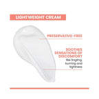 A white cream smear on a white background with text reading 'LIGHTWEIGHT CREAM', 'PRESERVATIVE-FREE', and 'SOOTHES SENSATIONS OF DISCOMFORT like tingling, burning and tightness'.